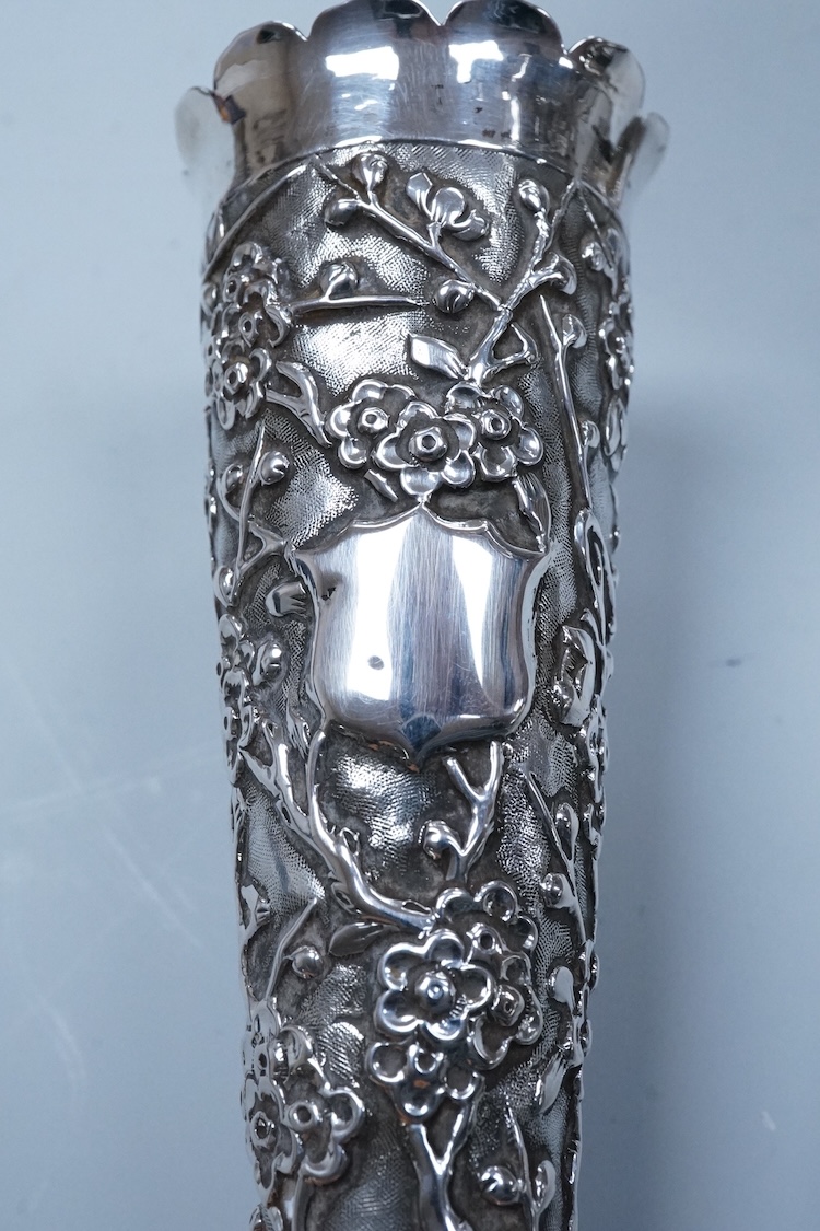 An early 20th century Chinese Export white metal posy vase, by Wang Hing, 18.4cm and a similar ewer by Tien Shing?, lacking cover.